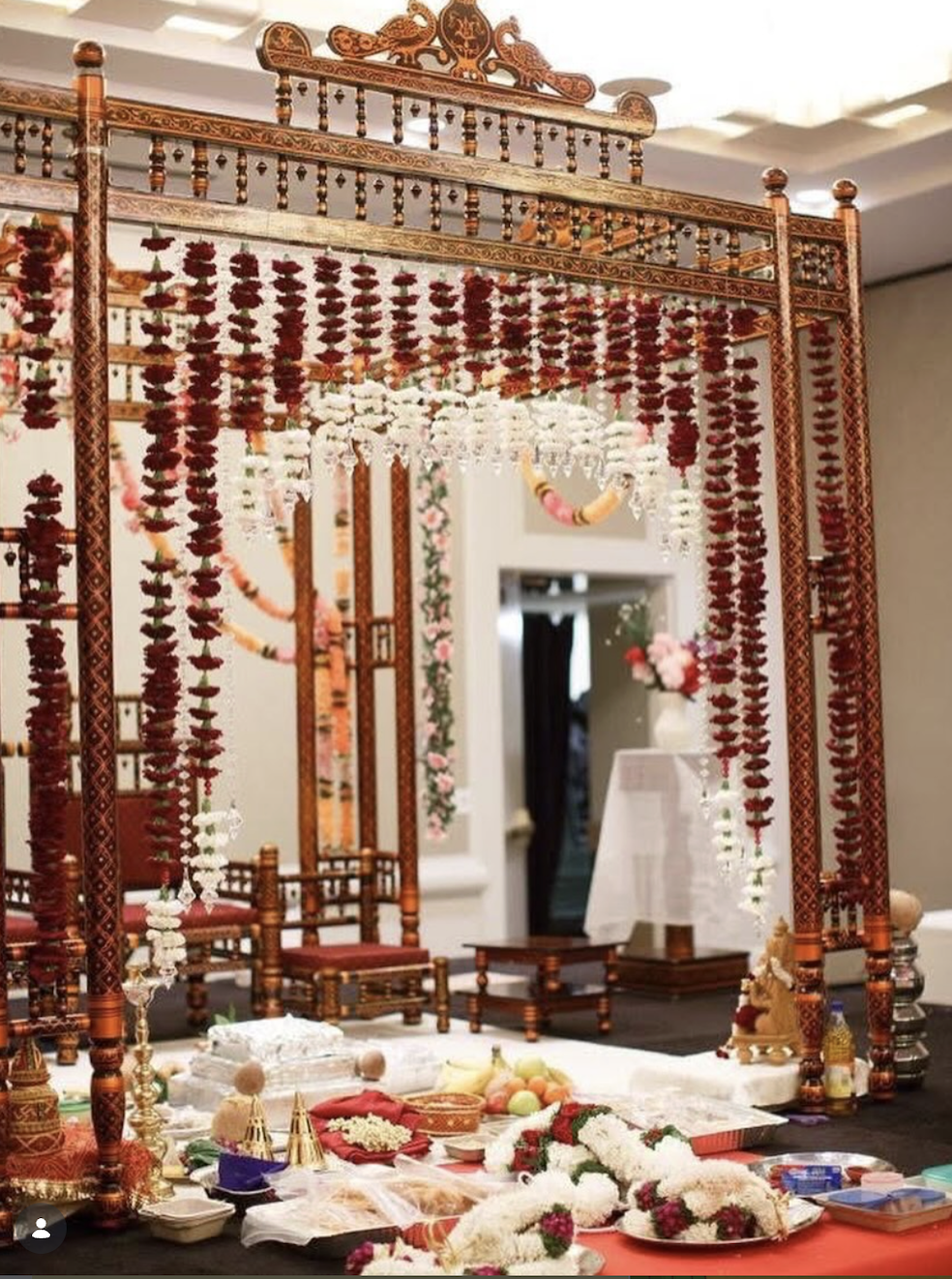 Decorated Indian wedding mandap — structure, draping, and floral design