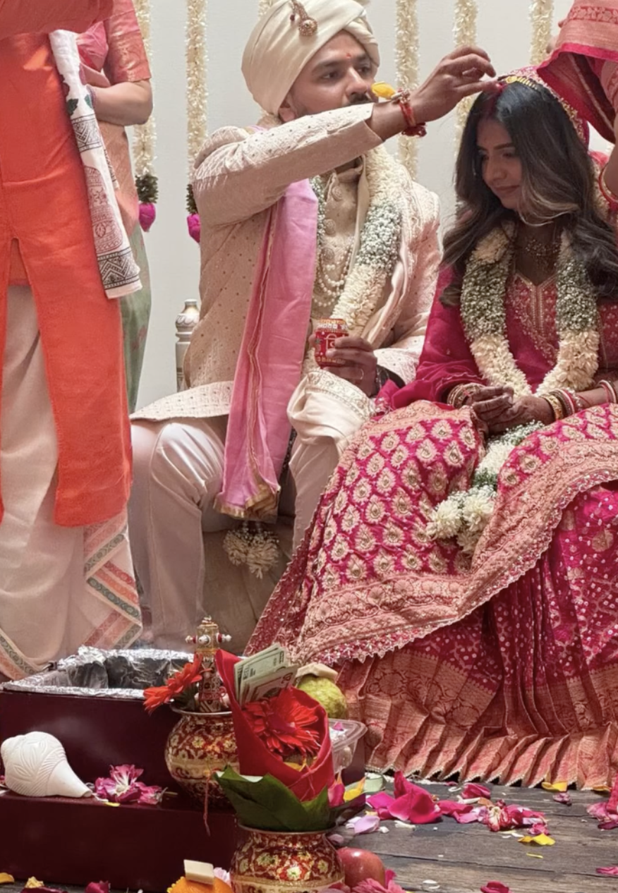 Wedding ceremony ritual with officiant and couple